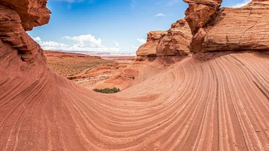 Sweeping sandstone slickrock swirls at The New Wave near Page, AZ